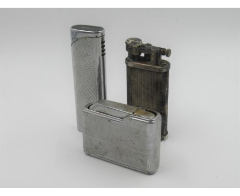 Dunhill silver plated cigarette lighter, together with two other cigarette lighters 