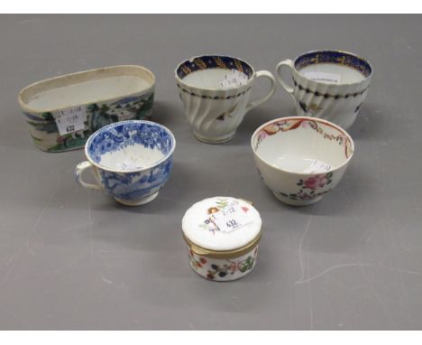Two early Worcester teacups with gilt floral decoration, tea bowl with handpainted floral decoration (at fault), Chinese dish