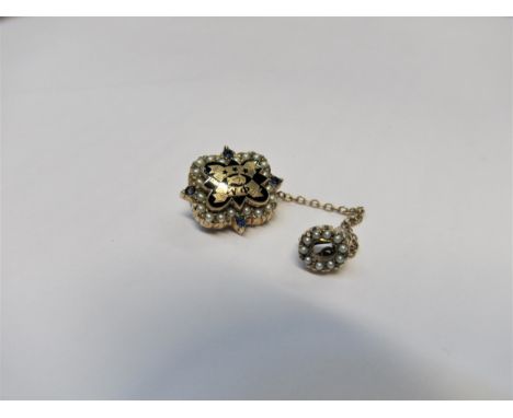 Russian yellow metal mourning brooch with black enamel monogram and safety chain, inscribed Rosemary Aiky, 1945 (at fault) 