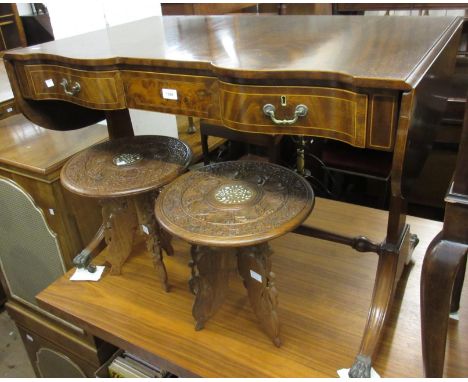 Reproduction mahogany drop leaf sofa table, with three frieze drawers, raised on splay supports, with brass casters 