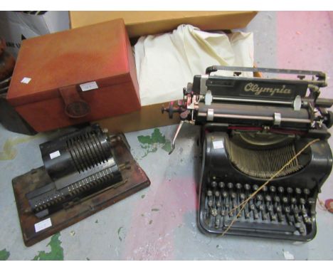 Olympia Model 8 typewriter, together with a Brunsviga No.118 adding machine, a leather cigar humidor box and a wedding dress 