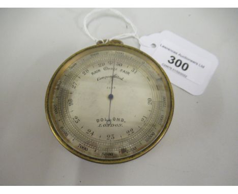 Brass cased compensated pocket barometer by Dollond No.5463, 2.5ins diameter 