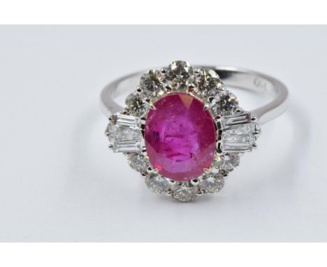 18ct White gold oval ruby and diamond cluster ring, the ruby approximately 2.14ct 