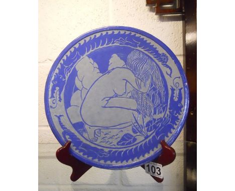 Oriental themed blue and white ceramic plate with nude female
