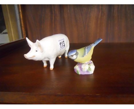 Beswick pig and Royal Worcester bird