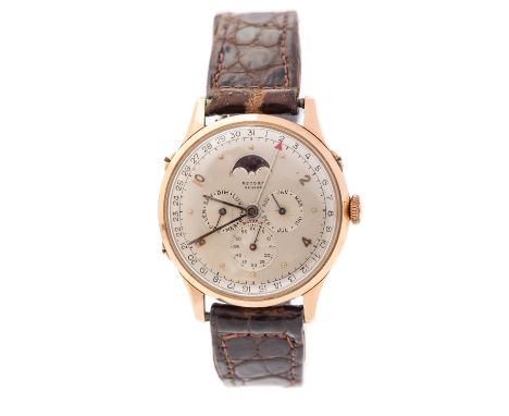 Record, Geneve, a circa 1950's gent's 14kt gold Record Datofix wristwatch, 3cm circular silvered dial with moon phase apertur