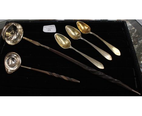 Five items of silver including: A George III silver brandy ladle, with turned wooden handle (split to handle), the plain bowl