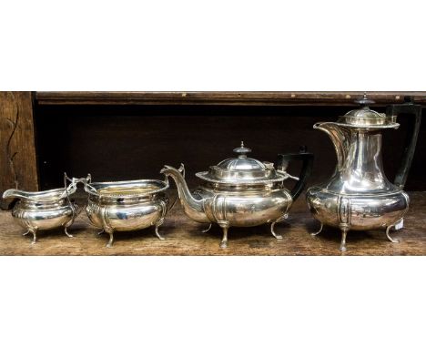 A George V Sterling silver four piece tea & coffee service, plain Georgian style with gadroon rim, each body engraved with in
