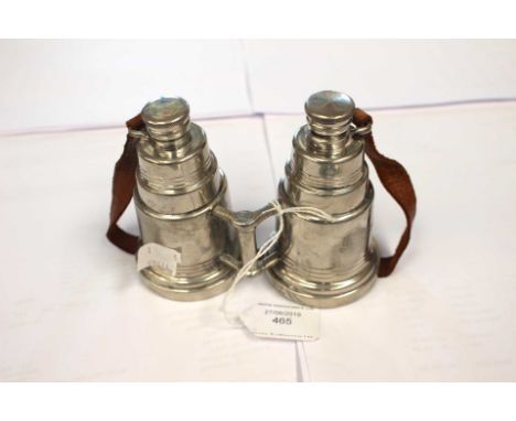 An early 20th Century novelty pewter double hip flask cast as a pair of binoculars, with leather strap, stamped English Pewte