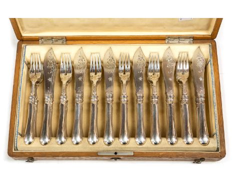 A 19th Century Austrian silver twelve piece fish knife and fork in fitted oak canteen, 800 standard maker's mark: TM