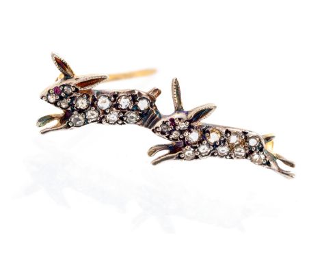 A diamond novelty yellow metal brooch, designed as a pair of running rabbits, set with rose-cut diamonds approx 0.75 carat to