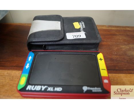 A Ruby Excel XD freedom scientific magnifier (lacking charger, sold as seen)