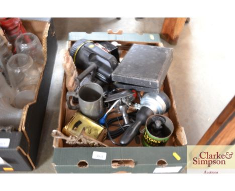 A box of various sundry items to include a torch, a mantel clock, an iron etc.