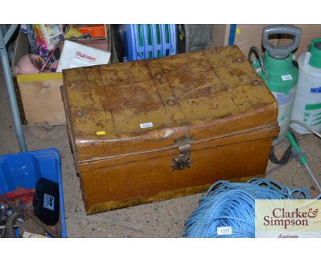 A metal travelling trunk