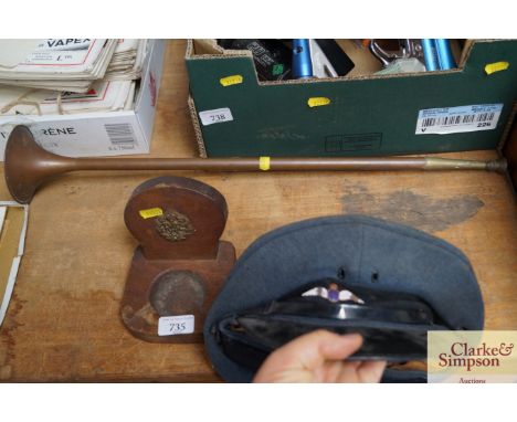 A trench art ash tray, RAF hat and copper horn