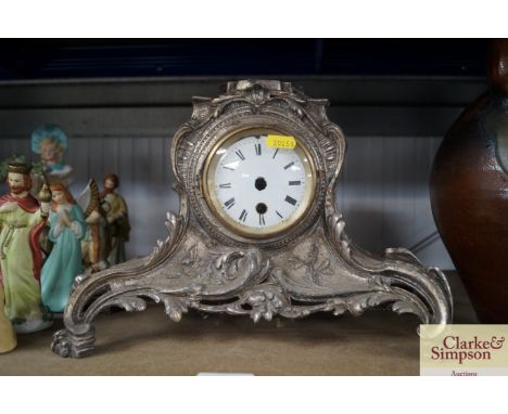 A single hole mantel clock
