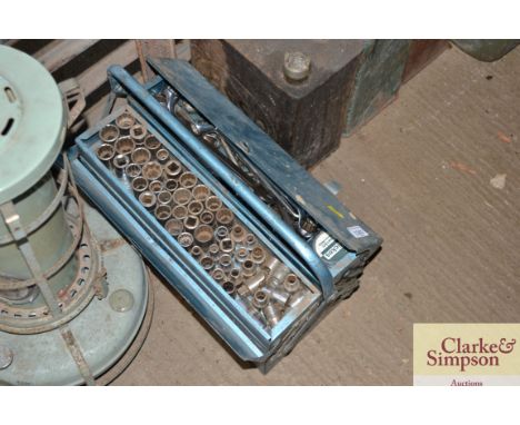 A metal cantilever tool box and contents of tools