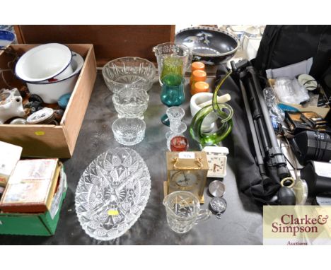 A mantel clock, various cut glass, mortar and pestle etc.