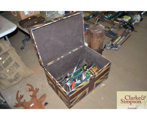 A travelling trunk decorated with a Union Jack and contents of various hand tools