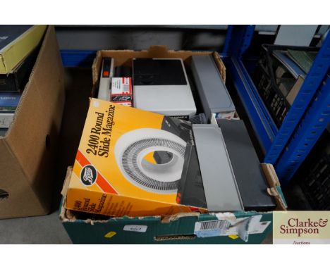 A Hanimex projector with various accessories (sold as seen)