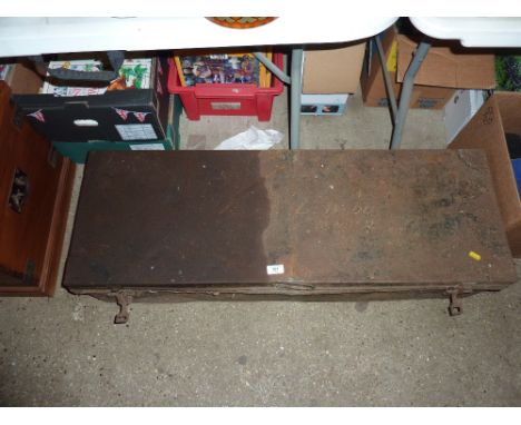 An oblong tin trunk 