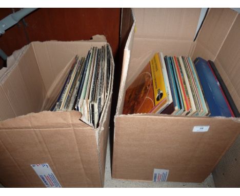 Two boxes of LP's and a projector - sold as collector's item