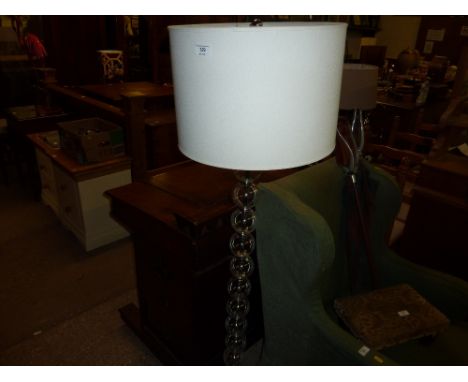 An Art Deco style standard lamp and shade 