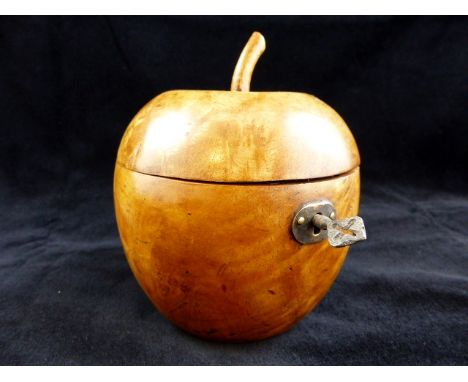 Fruitwood carved tea caddy in the shape of an apple with key