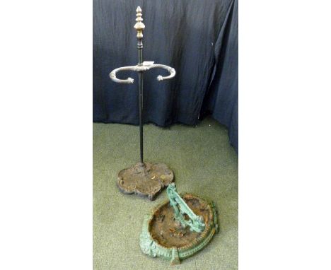 Cast iron antique stick stand and a cast iron boot scraper