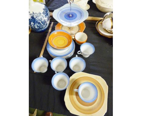 Blue six setting Shelley Art Deco tea service, an orange Shelley dripware trip, a two tier Shelley cake stand and two Shelley