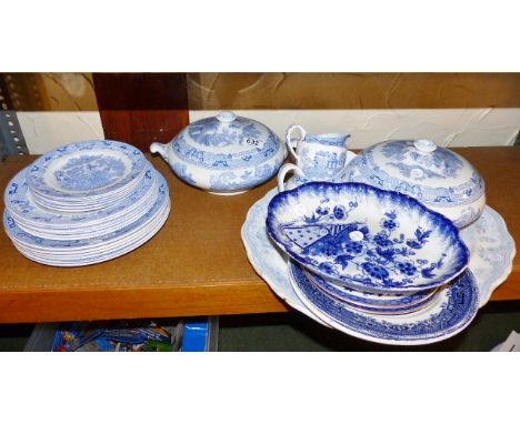 Shelf of blue and white china included lidded tureens