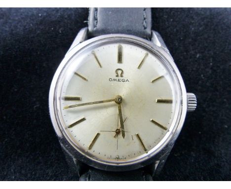 Vintage Omega stainless steel watch with subsidiary seconds on leather strap. Working at lotting up.
