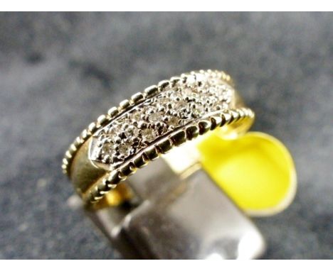 9 ct gold diamond set band.  Size R/S.