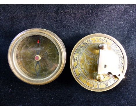 Brass compass with sundial to top stamped Stanley, London