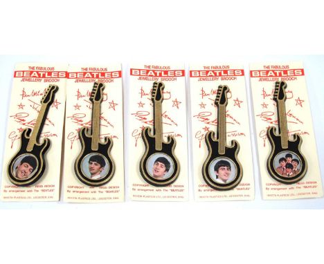 The Beatles Guitar Brouches, featuring each band member and a group shot (5).