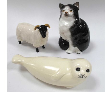 Lisa Larson, Sweden ceramic seal in cream, 16cm long. Doulton cat, Beswick sheep (3).