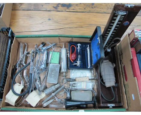 Medical Instruments, including external pelvimeter. Milne and Murray axis traction forceps, stethoscope, hypodermic needles i
