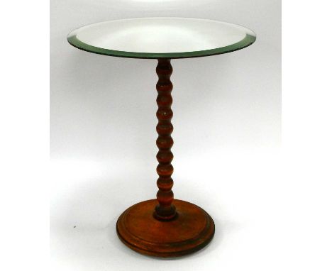 Vintage Shop Display Stand mid-1900s with a bevelled mirror top above a wooden bobbin base, 38cm diameter (18" high).