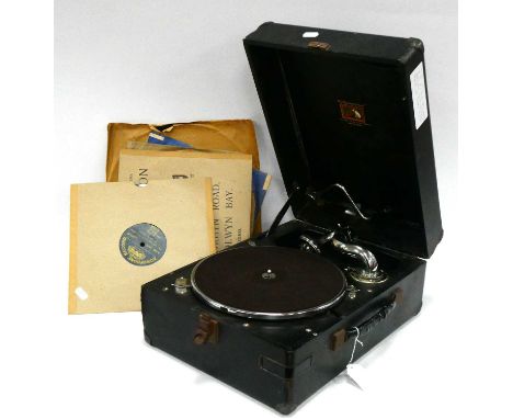 HMV Portable Gramophone, with black leatherette casing, a few records.