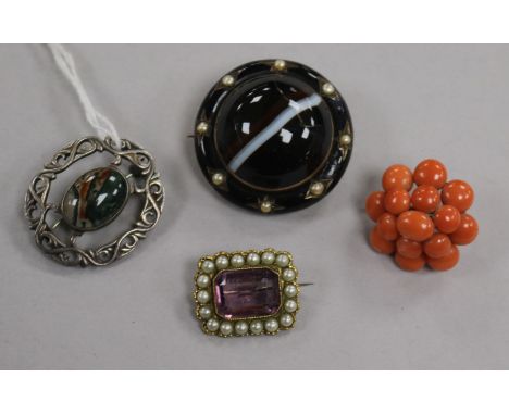 A Victorian yellow metal, enamel, seed pearl and banded agate brooch (af) and three other brooches including coral.