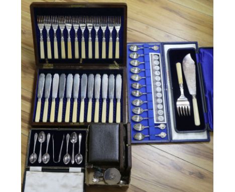 A cased set of silver spoons, silver compact, silver penknife, two other cased silver sets and three cases plated sets.