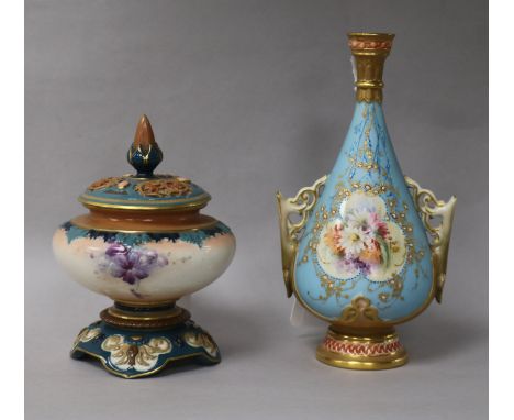 A Royal Worcester two-handled vase, shape no. 982 and a Hadley's Worcester 'Faience' pot pourri and cover, the ovoid footed v