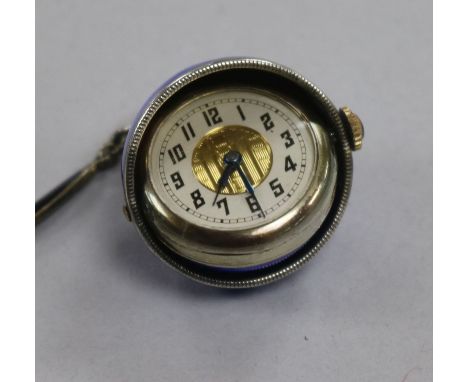 A late 19th/early 20th century continental white metal and enamel 'gravity' globe watch, on a white metal and enamel chain.