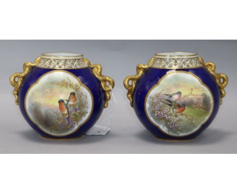 A pair of Grainger & Co Worcester two-handled vases, 1894, of globular form with reticulated rims, each heightened in gilt an