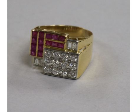 A 1950's? 18ct gold, pave set ruby and diamond cocktail ring, size O.