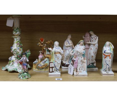 A Coalbrookdale-style flower-encrusted candlestick and a group of Staffordshire figures, late 18th/early 19th century, includ