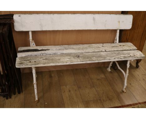 A small cast iron and wood garden bench W.125cm