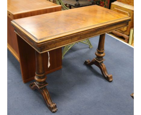 A Victorian walnut card table W.96cm