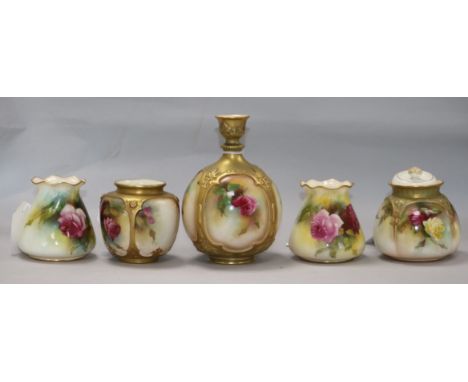 Five Royal Worcester small vases painted with roses, various, including a heavily gilded bottle-shaped vase with flowers in r