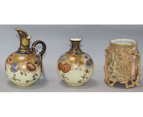 A Royal Worcester pierced chinoiserie vase, shape no. 956 and two Royal Crown Derby Imari-style vases, the Worcester vase of 